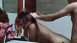 couple shares tender intimate moments in steamy hotel bath