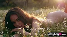 petite filipina kit rysha strips nude in wildflower field