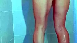 College stunner slips off Brazilian thong in steamy shower tease