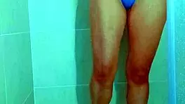 College stunner slips off Brazilian thong in steamy shower tease