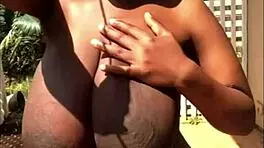 Huge boobs pregnant ebony babe teases natural tits solo.