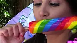 Skinny tattooed student flashes bikini outdoors for dirty tongue play