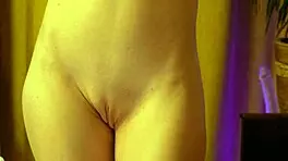 blonde beauty dances in strawberry panties hugging her round ass