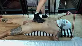 i strut confidently over his bare skin in tall boots