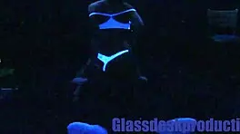 Scarlett Johnson glows under blacklight in mysterious solo tease