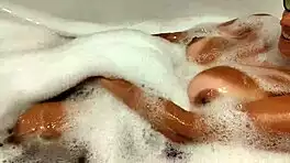 Tanned Big Tits Beauty Teases Pussy in Bathroom