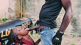 Petite biker babe stands on bike taking hard public garage fuck from man!