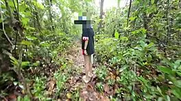 Thai babe hikes skirt flashing shaved pussy outdoors in garden