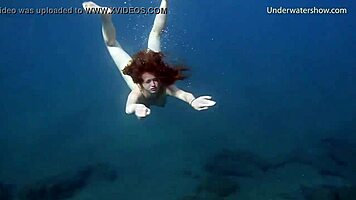 In Tenerife, Hot Ginger Teen 18+ Swims Underwater, Showing Off Bikini in Public Pool Scene