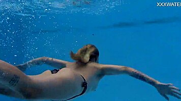 nude swimming in the pool babe with tattoos mimi cica